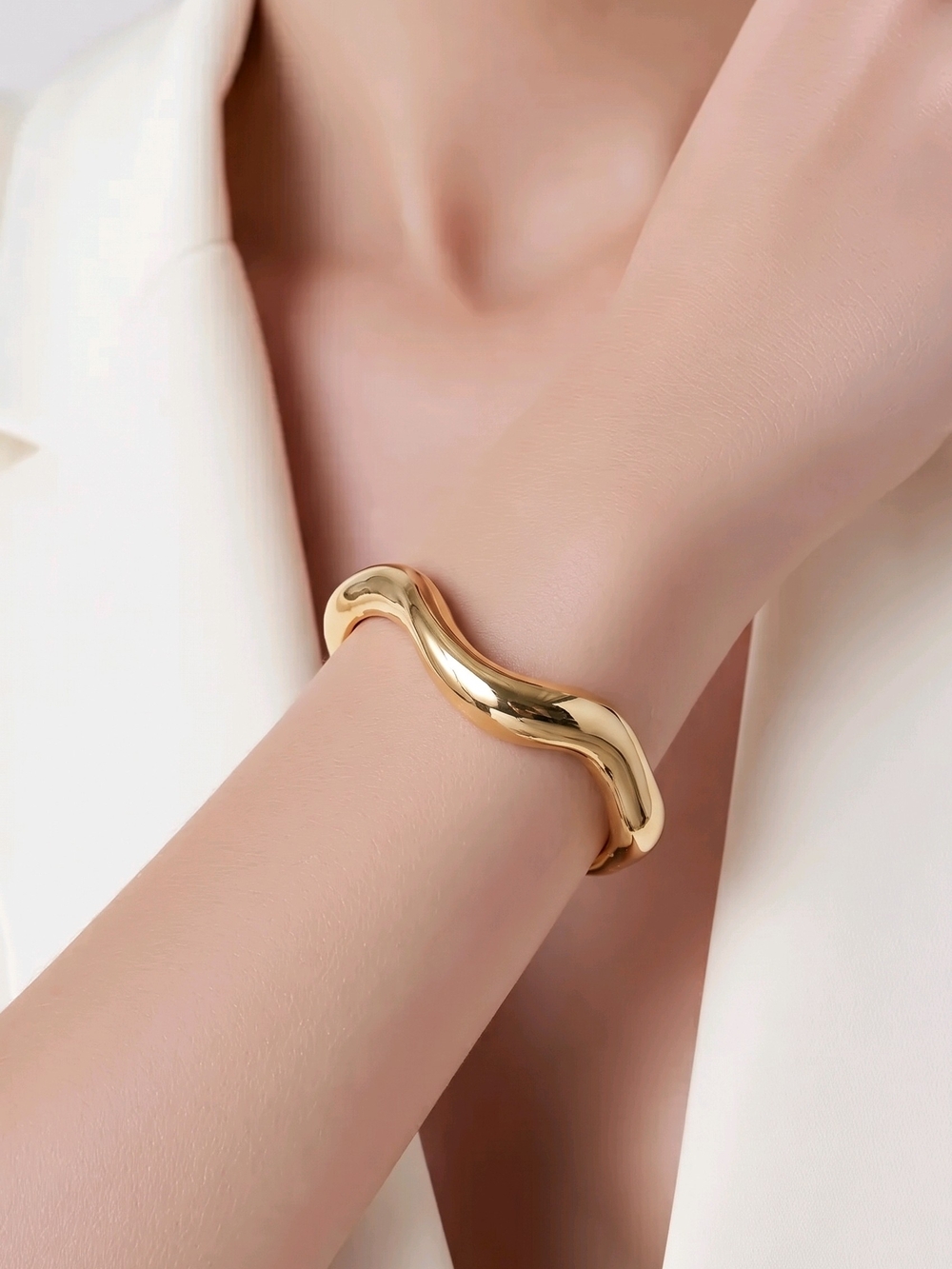 Gold-tone wave bangle Bracelet